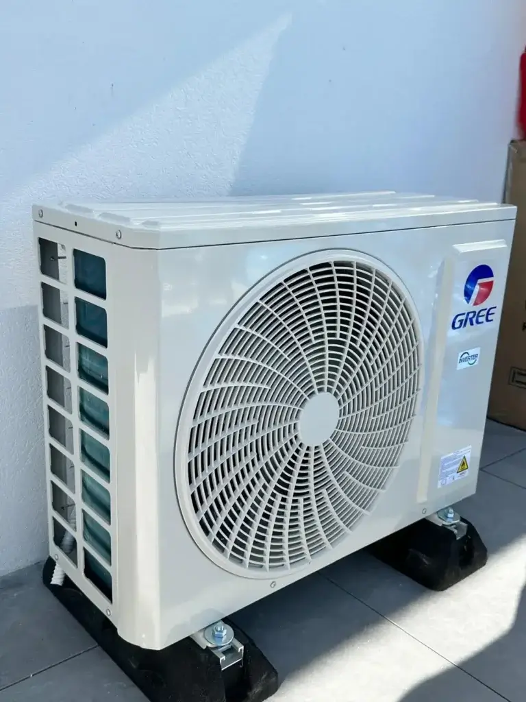 Outdoor air conditioning condenser installed on terrace